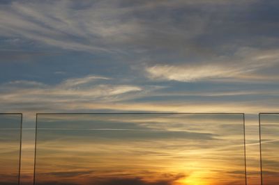 Low angle view of dramatic sky during sunset