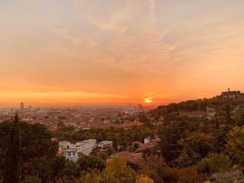 High angle view of townscape against sky during sunset