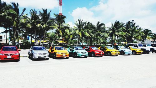 Cars on road against sky