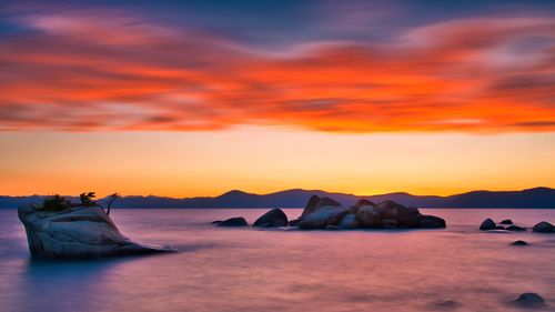 Scenic view of sea against sky during sunset