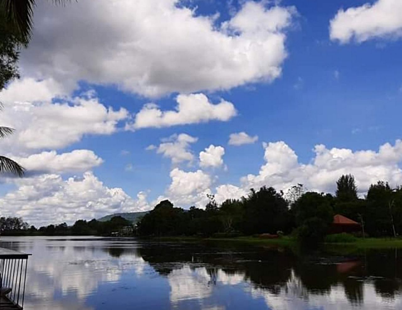 reflection, water, cloud, sky, lake, tree, nature, beauty in nature, scenics - nature, plant, tranquility, environment, body of water, landscape, no people, tranquil scene, travel destinations, blue, travel, tourism, outdoors, day, trip, vacation, mountain, non-urban scene, reservoir, land, holiday, idyllic, forest, reflection lake