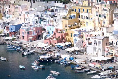 High angle view of boats in city