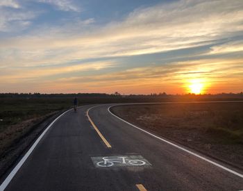 Road against sky during sunset