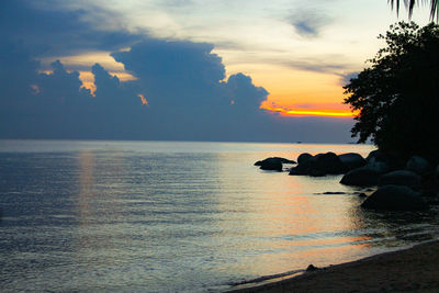 Scenic view of sea against sky during sunset