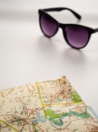 Close-up of sunglasses on white background