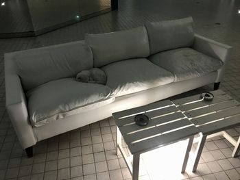 High angle view of sofa on bed at home
