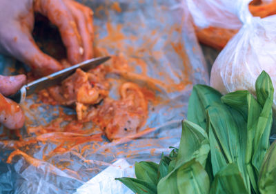 Close-up of hand holding leaves in market