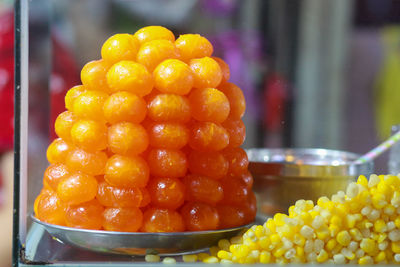 Stir-fried corn with salted egg in ho thi ky street food, ho chi minh city