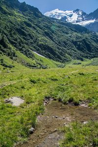 Dirt road passing through a valley