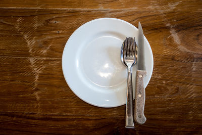 High angle view of empty plate on table