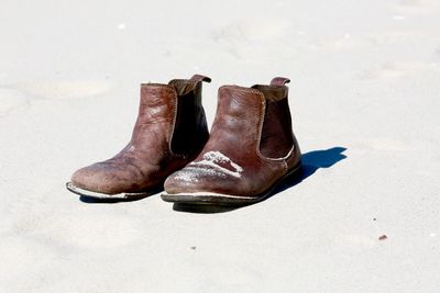 Leather boots on beach