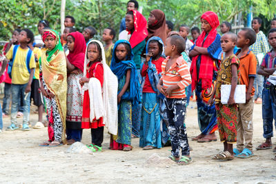 Group of people standing outdoors