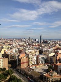 Aerial view of cityscape against sky