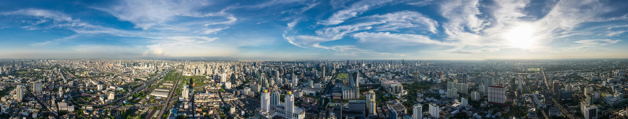 High angle view of city against cloudy sky