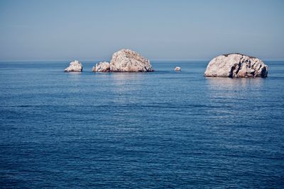 Scenic view of sea against clear sky