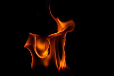 Close-up of fire against black background