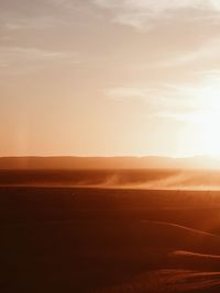 Scenic view of sahara desert against sky during sunset