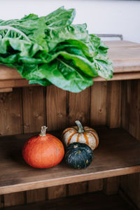 High angle view of pumpkins on cutting board