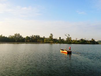 Boat sailing in lake