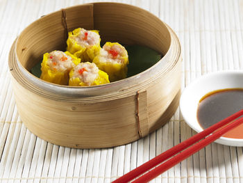 Close-up of dumplings in container on table