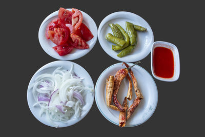 High angle view of food on table against black background