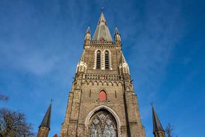 Low angle view of cathedral against blue sky