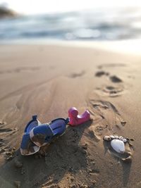 Close-up of toy on beach