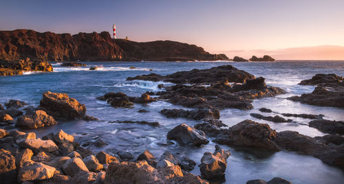 Scenic view of sea against sky during sunset