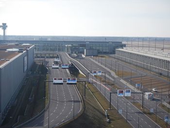 High angle view of roads at airport against sky