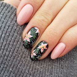 High angle view of woman hand showing nail art 