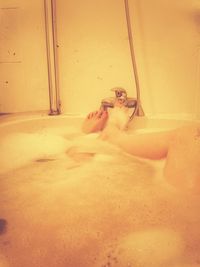 Close-up of woman standing in pond