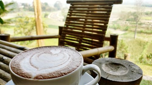 Close-up of coffee cup on table