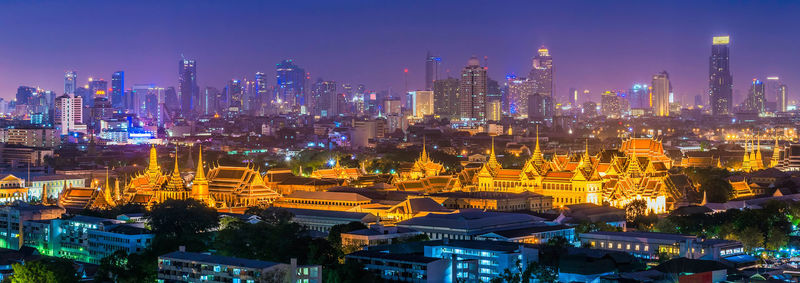 Illuminated cityscape at night