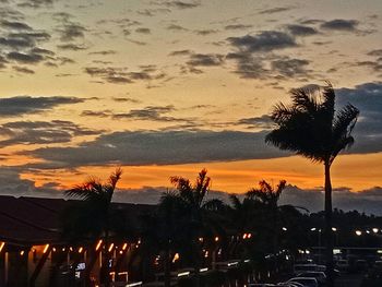 Silhouette trees against sky during sunset