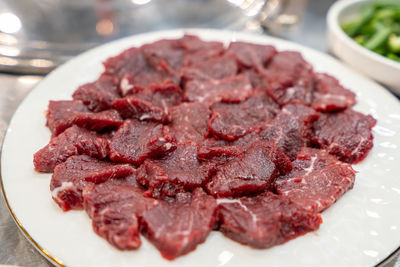 Andong raw beef mungtigi slices served on a plate. taken in andong, south korea