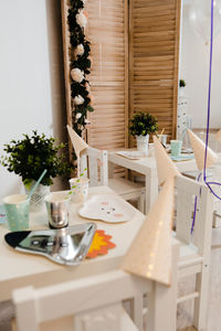 Potted plants on table at home