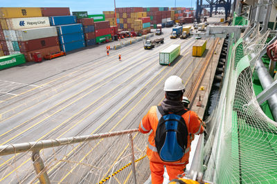 High angle view of people walking on road
