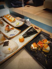 High angle view of sushi served on table