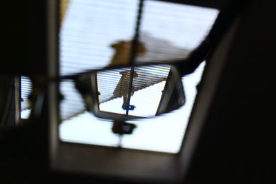 High angle view of mobile phone on window