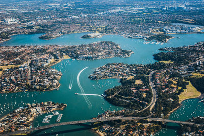 Aerial view of buildings by sea