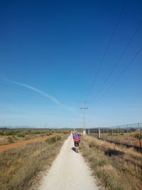 Road passing through field