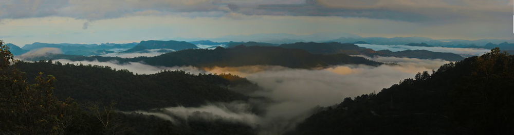 Panoramic view of mountains against sky during sunset