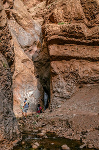 People on rock formations