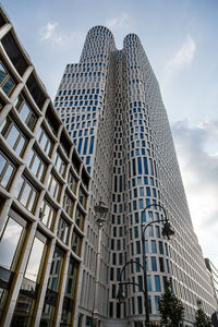 Low angle view of skyscrapers against sky