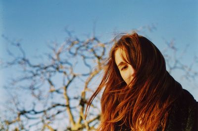 Close-up portrait of woman with brown hair