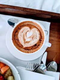 High angle view of cappuccino on table