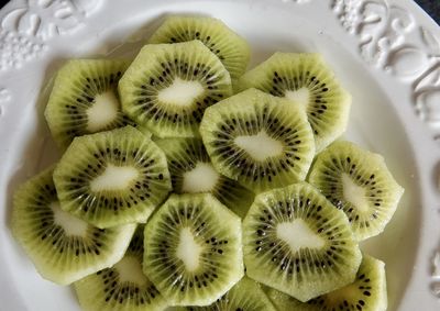 High angle view of chopped fruits in plate
