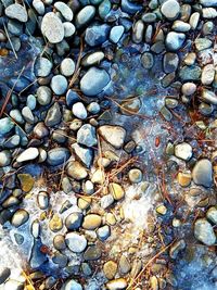 Full frame shot of pebbles on beach