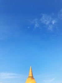 Low angle view of building against blue sky