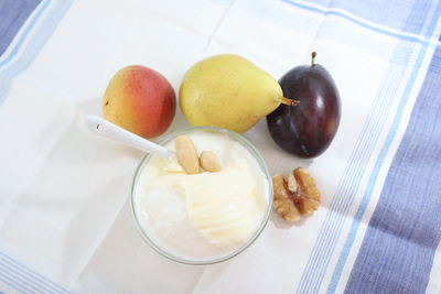 High angle view of fruits in plate on table